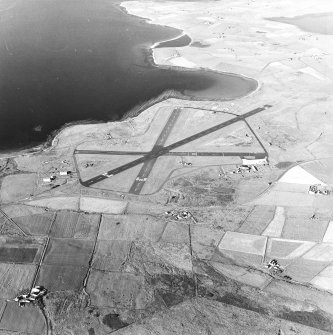 Oblique aerial view of Orkney, Kirkwall Airport, general view taken from the SW.