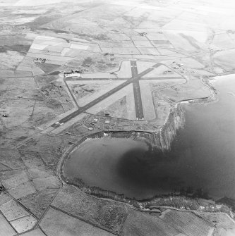 Oblique aerial view of Orkney, Kirkwall Airport, general view taken from the NE.