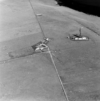 Oblique aerial view of Sanday, The Wart, Post Office Radio Station and telephone exchange, taken from the SW.