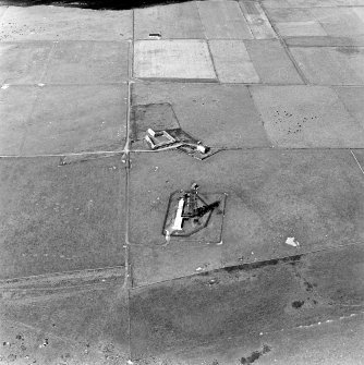 Oblique aerial view of Sanday, The Wart, Post Office Radio Station and telephone exchange, taken from the SE.