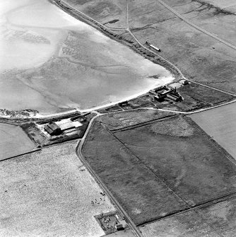 Oblique aerial view of Sanday, Stove Farmhouse, old steading, new steading and workmen's cottages, taken from the NE
