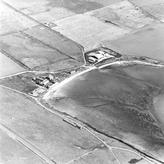 Oblique aerial view of Sanday, Stove Farmhouse, old steading, new steading and workmen's cottages, taken from the SW