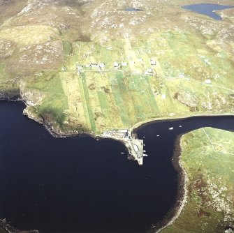 Oblique aerial view centred on the township and pier, taken from the SSE.