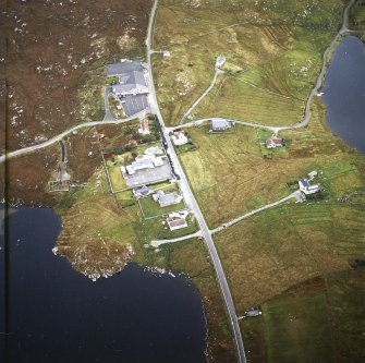Oblique aerial view centred on the township, taken from the S.