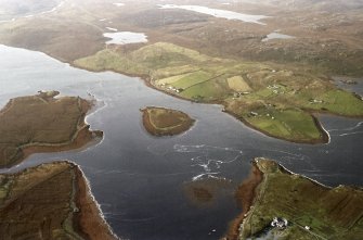 General oblique aerial view looking across Loch Roag towards Linshader, taken from the NE.