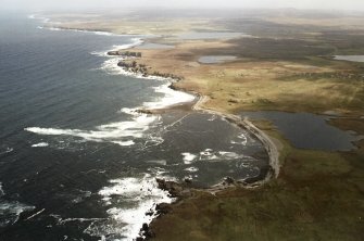 General oblique aerial view looking across Port Arnol up the west coast with Loch Arnol adjacent, taken from the WSW.