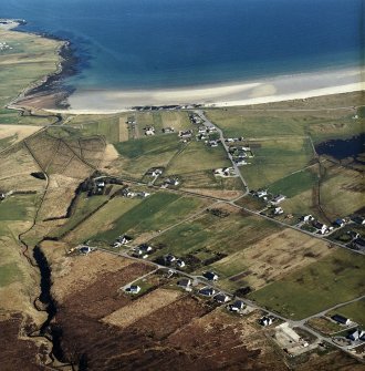 Oblique aerial view centred on the crofting township, taken from the NW.