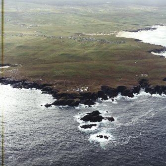 General oblique aerial view looking across the lighthouse towards Eoropie, taken from the N.