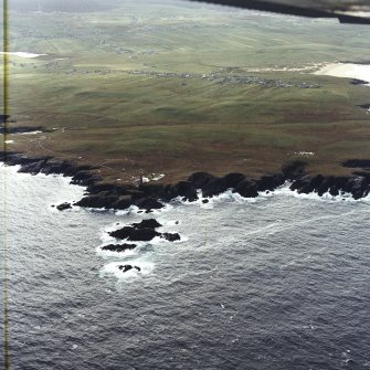 General oblique aerial view looking across the lighthouse towards Eoropie, taken from the NNW.