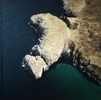 Oblique aerial view centred on the remains of the fort, taken from the W.
