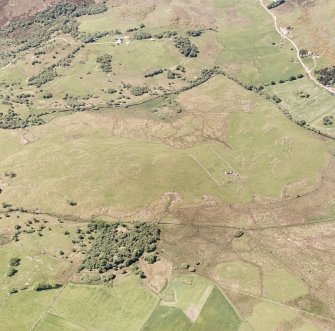 Little Rogart, oblique aerial view, taken from the E, showing an area defined as an archaeological landscape.