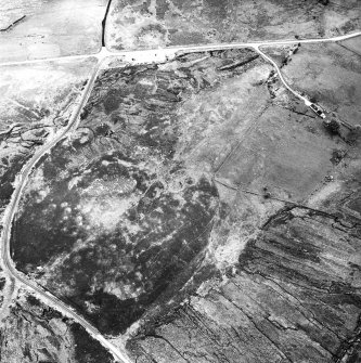 Dremergid, oblique aerial view, taken from the NW, centred on an area defined as an archaeological landscape, and burnt mounds. Hut-circles, small cairns, a bank and a field-system are visible in the top left-hand corner of the photograph.