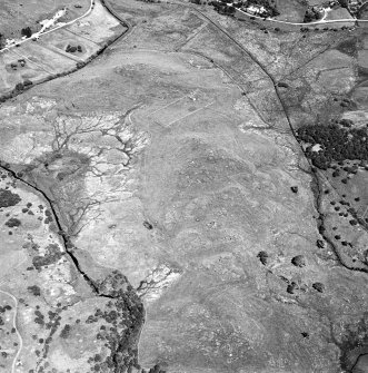 Little Rogart, oblique aerial view, taken from the S, showing an area defined as an archaeological landscape.