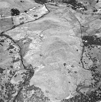 Little Rogart, oblique aerial view, taken from the S, showing an area defined as an archaeological landscape.