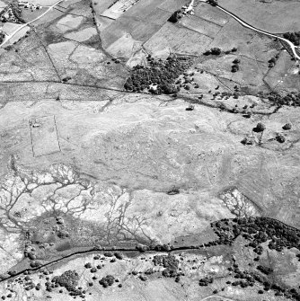 Little Rogart, oblique aerial view, taken from the WSW, showing an area defined as an archaeological landscape.