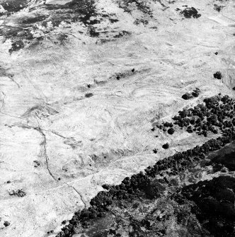 Leataidh, oblique aerial view, taken from the W, showing an area with townships.