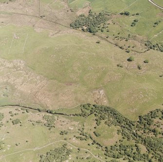 Little Rogart, oblique aerial view, taken from the W, showing an area defined as an archaeological landscape.