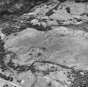 Little Rogart, oblique aerial view, taken from the ENE, showing an area defined as an archaeological landscape.