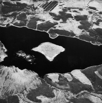 Loch Salachaidh, oblique aerial view, taken from the S, showing a general view of Loch Salachaidh in the centre of the photograph, with two hut-circles in the bottom right-hand corner.