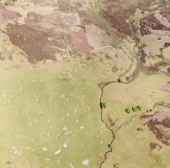 Morvich Burn, oblique aerial view, taken from the SW, centred on a town-ship. Hut-circles and a field-system are visible in the top left-hand corner of the photograph.