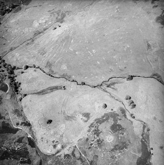 Morvich Burn, oblique aerial view, taken from the ESE, centred on a township. Sheepfolds are visible in the centre left half of the photograph.