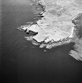 Stroma, oblique aerial view, taken from the SW, centred on Mell Head.