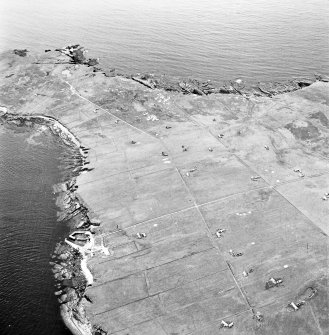Stroma, oblique aerial view, taken from the ESE, centred on Uppertown township.