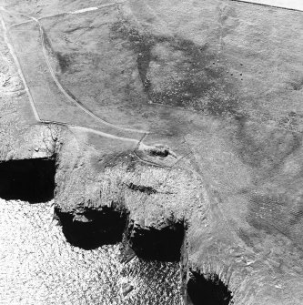 Oblique aerial view of Isbister chambered cairn, taken from the ENE.