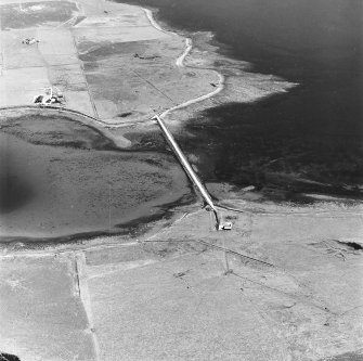Oblique aerial view of Orkney, Burray, Hunda, Hunda Reef barrier taken from the NW.