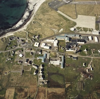 Oblique aerial view centred on the village, taken from the SSW.