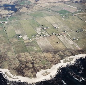 Oblique aerial view centred on the crofting township, taken from the WNW.