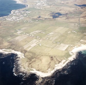 General oblique aerial view centred on the crofting township with the village adjacent, taken from the W.