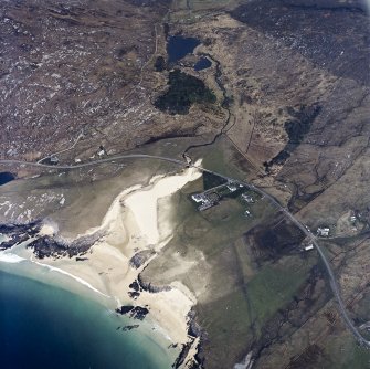 Oblique aerial view centred on the lodge and house, taken from the W.