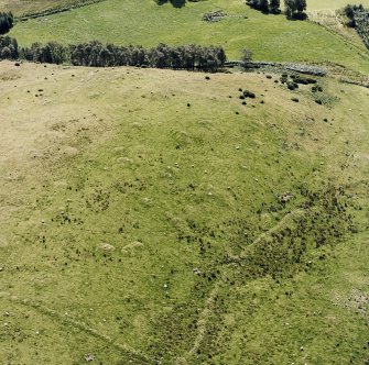 Oblique aerial view of Garbeg centred on the remains of hut-circles, small cairns and a field-system, taken from the N.