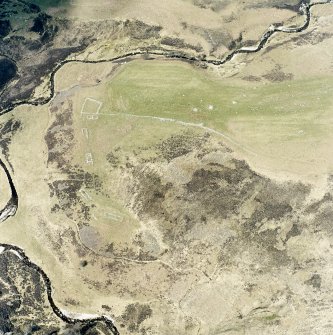 Oblique aerial view of Achad a'Chatha, taken from the SE, centred on the remains of a township.