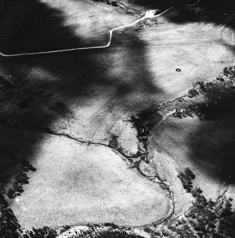 Upper Raitts, oblique aerial view, taken from the ENE, centred on the remains of a township.