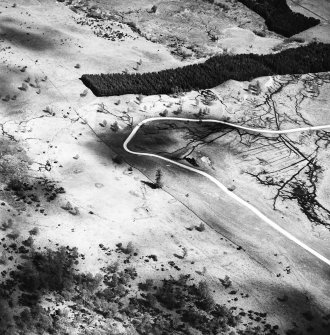 Croftcarnoch, oblique aerial view, taken from the SW, centred on the remains of a farmstead.