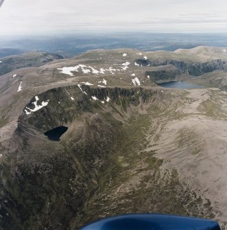 Oblique aerial view looking over Loch Etchachan towards Stathspey with Ben MacDui adjacent, taken from the S.