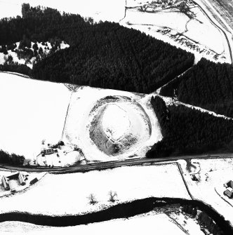 Oblique aerial view, taken from the ESE, of Doune of Invernochty Motte.