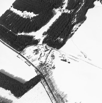 Oblique aerial view of Mill of Newe centred on the water mill and house, with Coull of Newe farmstead adjacent, taken from the SSE.