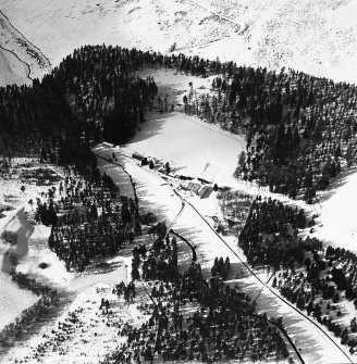 Oblique aerial view of Glenbuchat lodge, centred on the shooting lodge, taken from the SE.