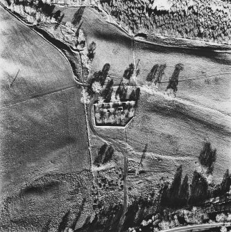 Aboyne Old Parish Church, oblique aerial view, taken from the S, centred on the church, with the dismantled Aboyne Extension of The Deeside Railway Line visible in the bottom right-hand corner of the photograph.