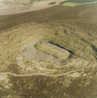 Oblique aerial view centred on the remains of the vitrified fort, taken from the S.