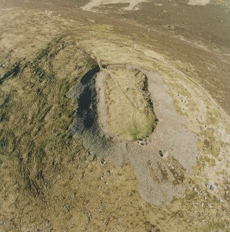 Oblique aerial view of Tap O' Noth vitrified fort, taken from the NW.