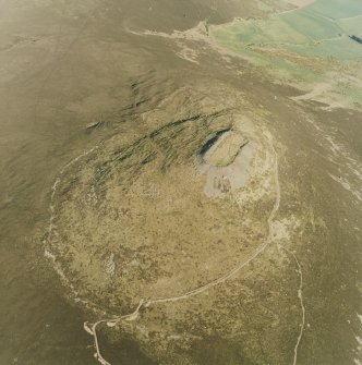 Oblique aerial view of Tap O' Noth vitrified fort, taken from the WNW.