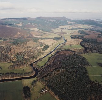 General oblique aerial view from Craigmeadow farmsteading, taken from the SW looking NE along the River Don towards Bennachie, with My Lord's Throat on the left side of photograph.