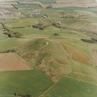 Oblique aerial view centred on the remains of the fort taken from the WNW.