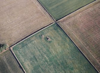 Oblique aerial view centred on the remains of the recumbent stone circle, taken from the W.