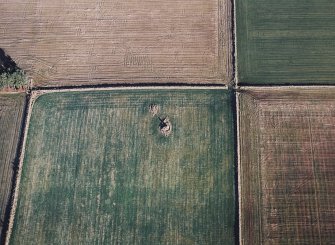 Oblique aerial view centred on the remains of the recumbent stone circle, taken from the SW.