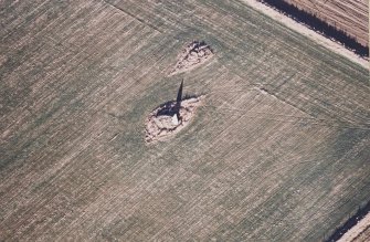 Oblique aerial view centred on the remains of the recumbent stone circle, taken from the SSW.